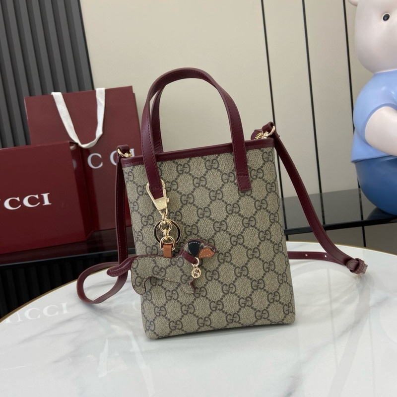 G*u*i top handle bags